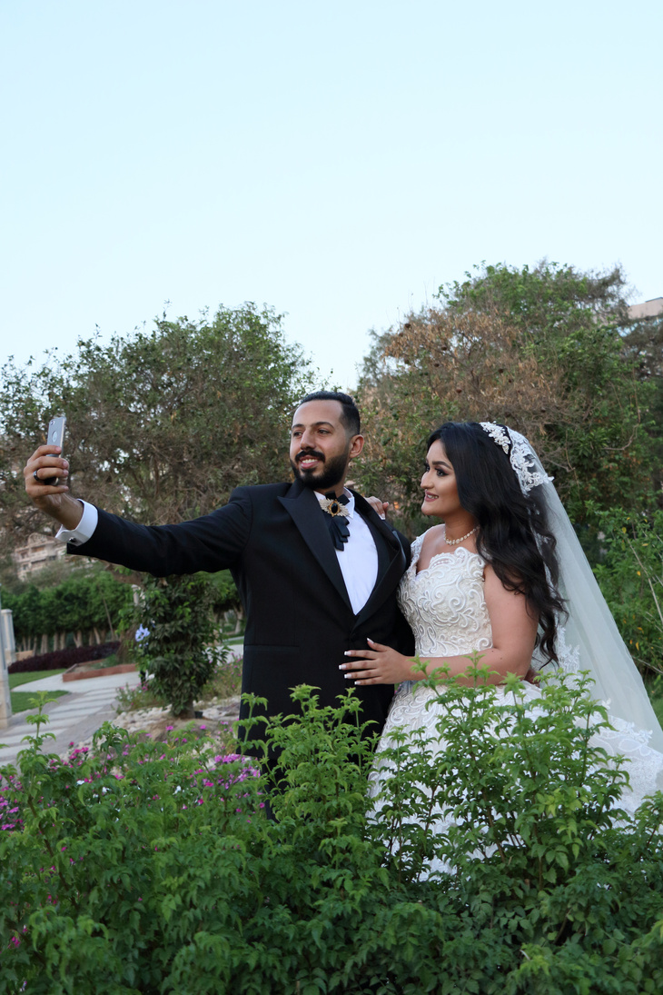Bridal Couple Taking Selfie